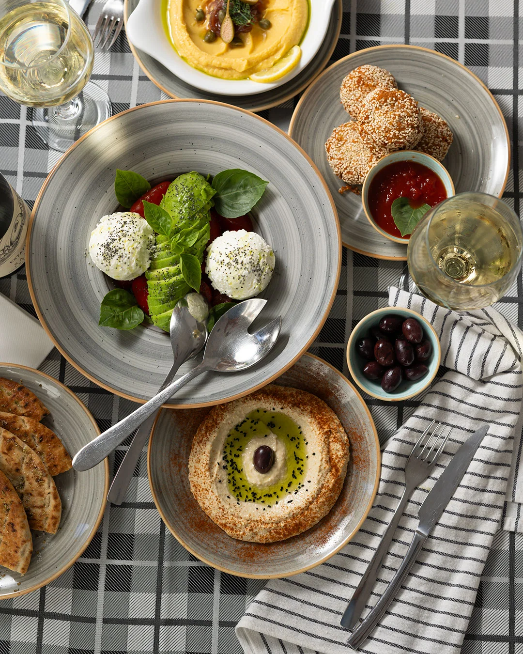 Selection of Greek dishes and wine