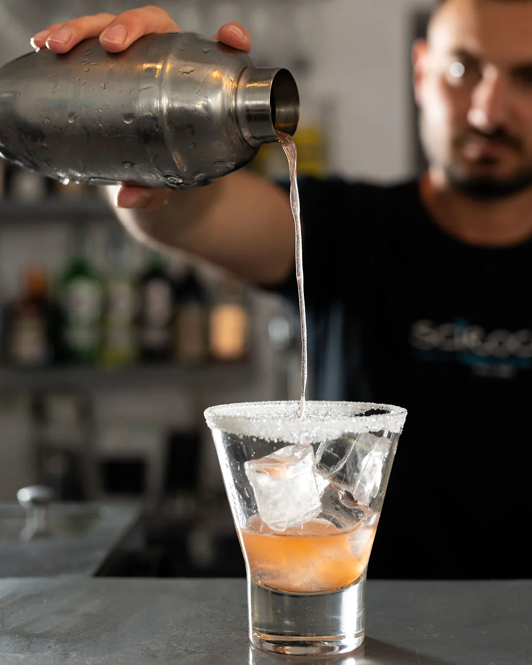 Cocktail being prepared at the bar